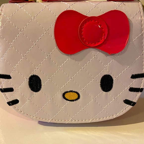 Hello Kitty Handbags - Hello Kitty mini Purse 👛. So adorable! 🥰